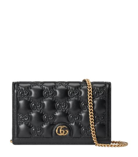 matelassé leather wallet on a chain gucci|GG Matelassé leather chain wallet in black .